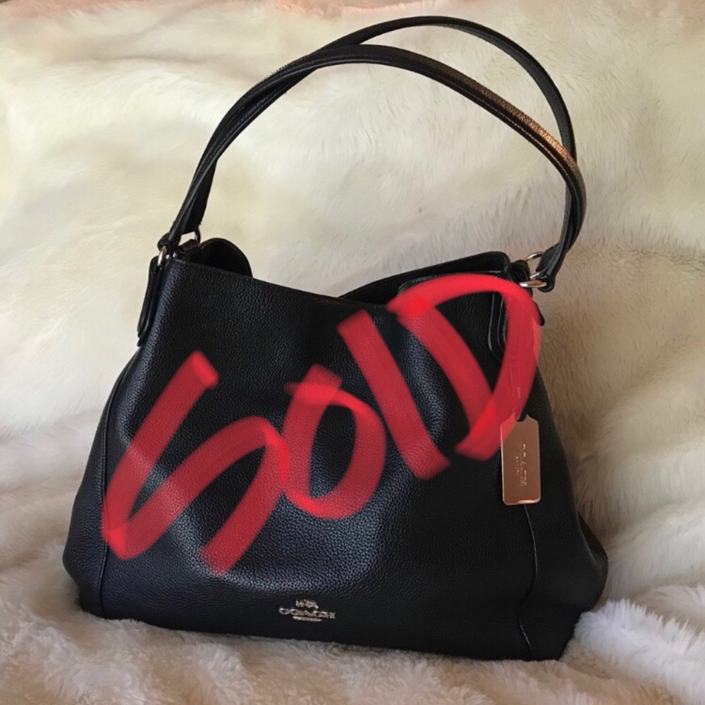 SOLD Coach Edie 31 handbag in black pebbled